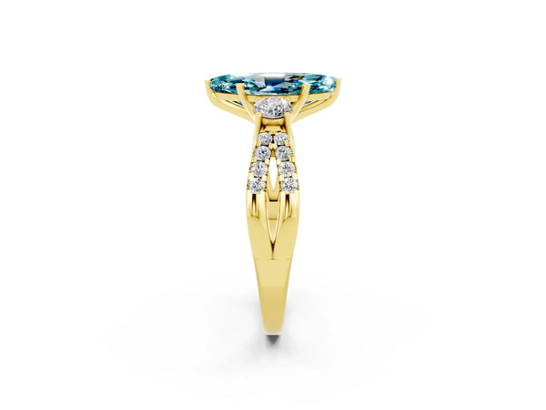 Yellow gold Marquise Cut Blue Topaz Three-Stone Ring with Pavé Split Shank and Four-Prong Setting