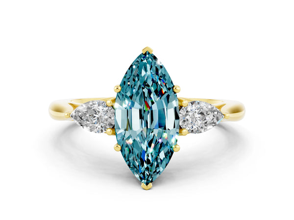Yellow gold Marquise Cut Blue Topaz Three-Stone Ring with Pear  Side Stones and Prong Setting