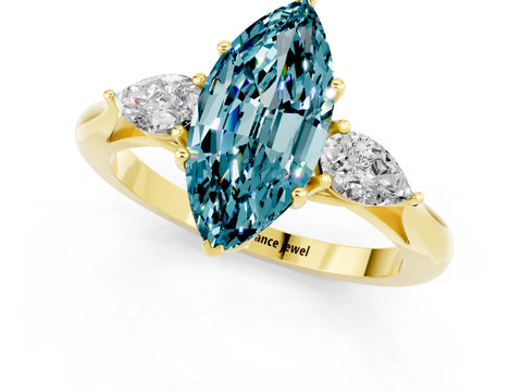 Yellow gold Marquise Cut Blue Topaz Three-Stone Ring with Pear Side Stones and Four-Prong Setting_13