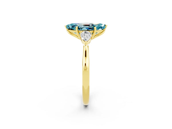 Yellow gold Marquise Cut Blue Topaz Three-Stone Ring with Pear  Side Stones and Prong Setting