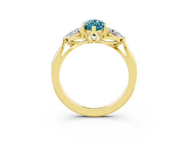 Yellow gold Marquise Cut Blue Topaz Three-Stone Ring with Pear  Side Stones and Prong Setting