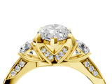 Yellow gold Marquise Cut Brilliant Three-Stone Diamond Ring with Pavé Band and Four-Prong Setting_7
