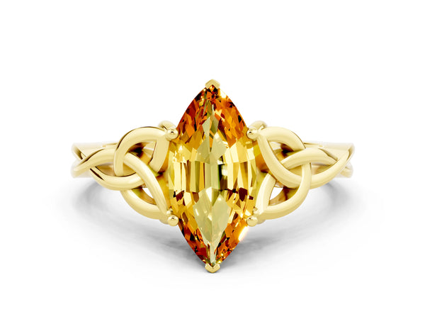 Yellow gold Marquise Cut Citrine Solitaire Celtic Knot Ring with Four-Prong Setting