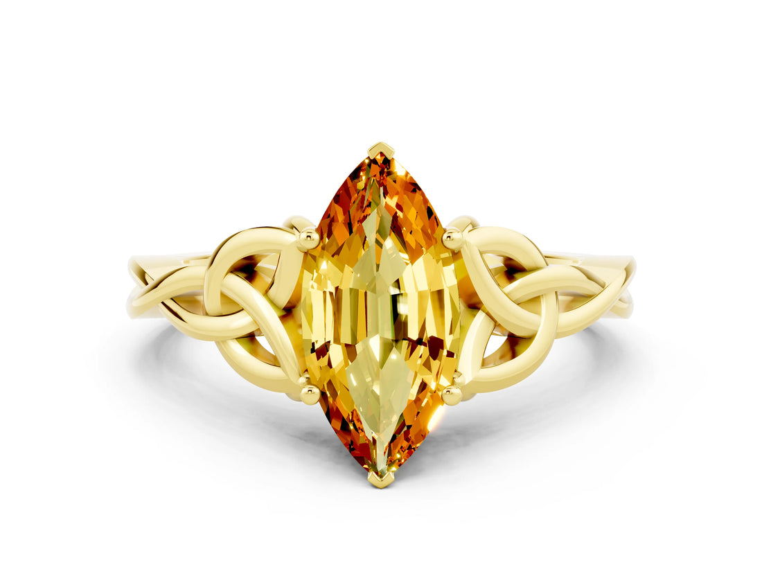 Yellow gold Marquise Cut Citrine Solitaire Engagement Ring with Celtic Knot Band and Four-Prong Setting