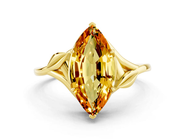 Yellow gold Marquise Cut Citrine Solitaire Ring with Twist Band and Four-Prong Setting