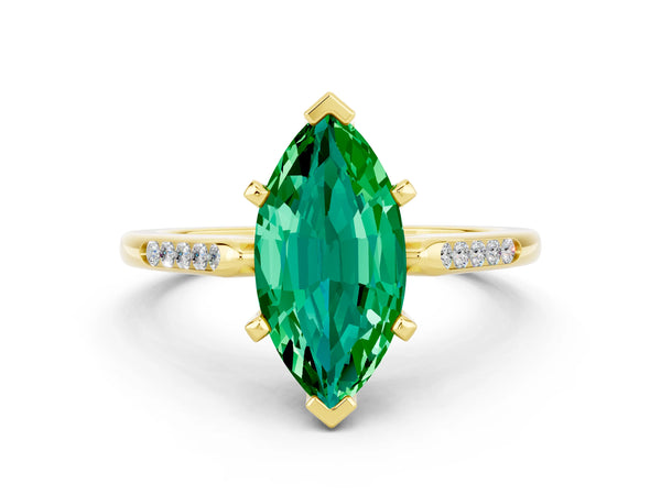 Yellow gold Marquise Cut Emerald Solitaire Ring with Channel Set Round Band and Prong Setting
