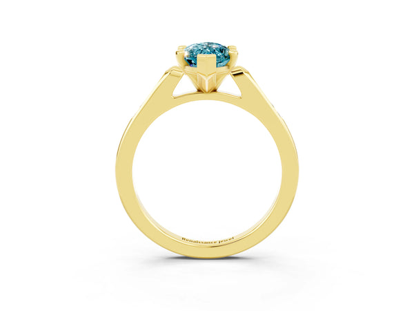 Yellow gold Marquise Cut Blue Topaz Solitaire Ring with Channel Set Round Band and Prong Setting