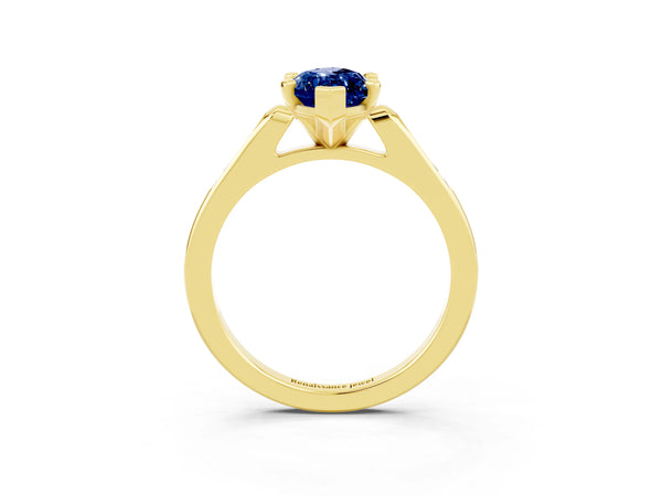 Yellow gold Marquise Cut Blue Sapphire Solitaire Ring with Channel Set Round Band and Prong Setting