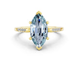 Yellow gold Marquise Cut Cut Channel Set Solitaire Engagement Ring with Four-Prong Setting