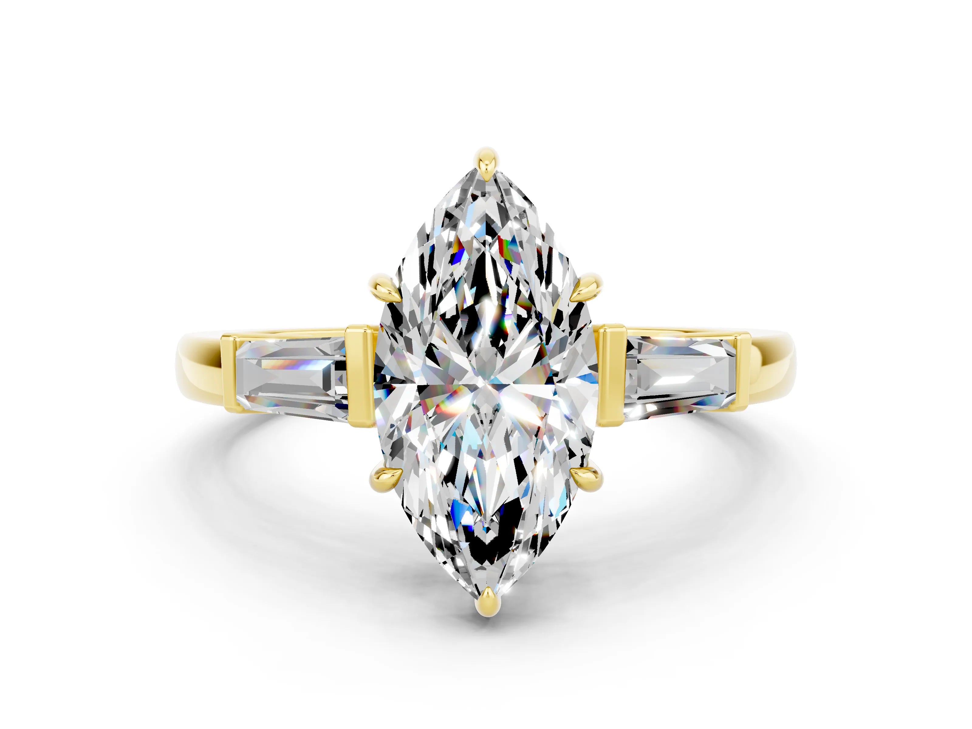 Yellow gold Marquise Cut Cut Diamond Ring with Tapered Baguette Side Stones in Four-Prong Setting