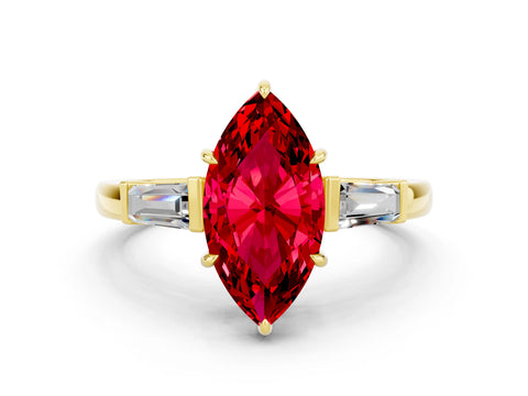 Yellow gold Marquise Cut Cut Diamond Ring with Tapered Baguette Side Stones in Four-Prong Setting