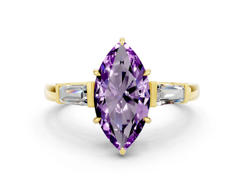 Yellow gold Marquise Cut Cut Diamond Ring with Tapered Baguette Side Stones in Four-Prong Setting
