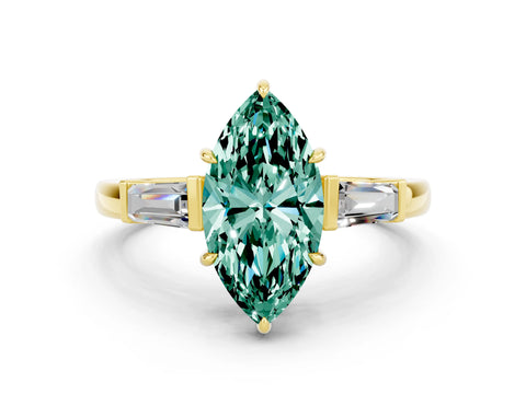 Yellow gold Marquise Cut Cut Diamond Ring with Tapered Baguette Side Stones in Four-Prong Setting