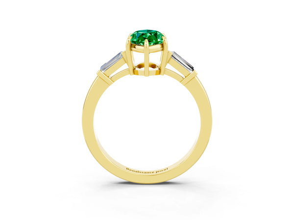 Yellow gold Marquise Cut Emerald Three-Stone Ring with Tapered Baguette Side Stones and Prong Setting
