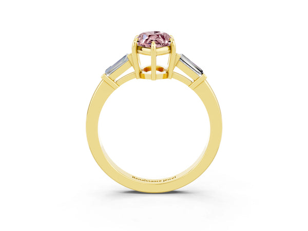 Yellow gold Marquise Cut Cut Diamond Ring with Tapered Baguette Side Stones in Four-Prong Setting