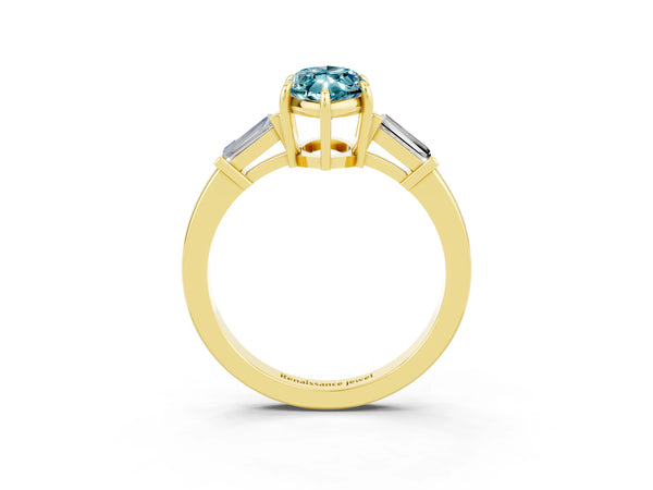 Yellow gold Marquise Cut Cut Diamond Ring with Tapered Baguette Side Stones in Four-Prong Setting