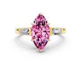 Yellow gold Marquise Cut Cut Diamond Ring with Tapered Baguette Side Stones in Four-Prong Setting