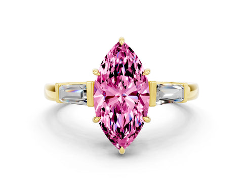 Yellow gold Marquise Cut Cut Diamond Ring with Tapered Baguette Side Stones in Four-Prong Setting