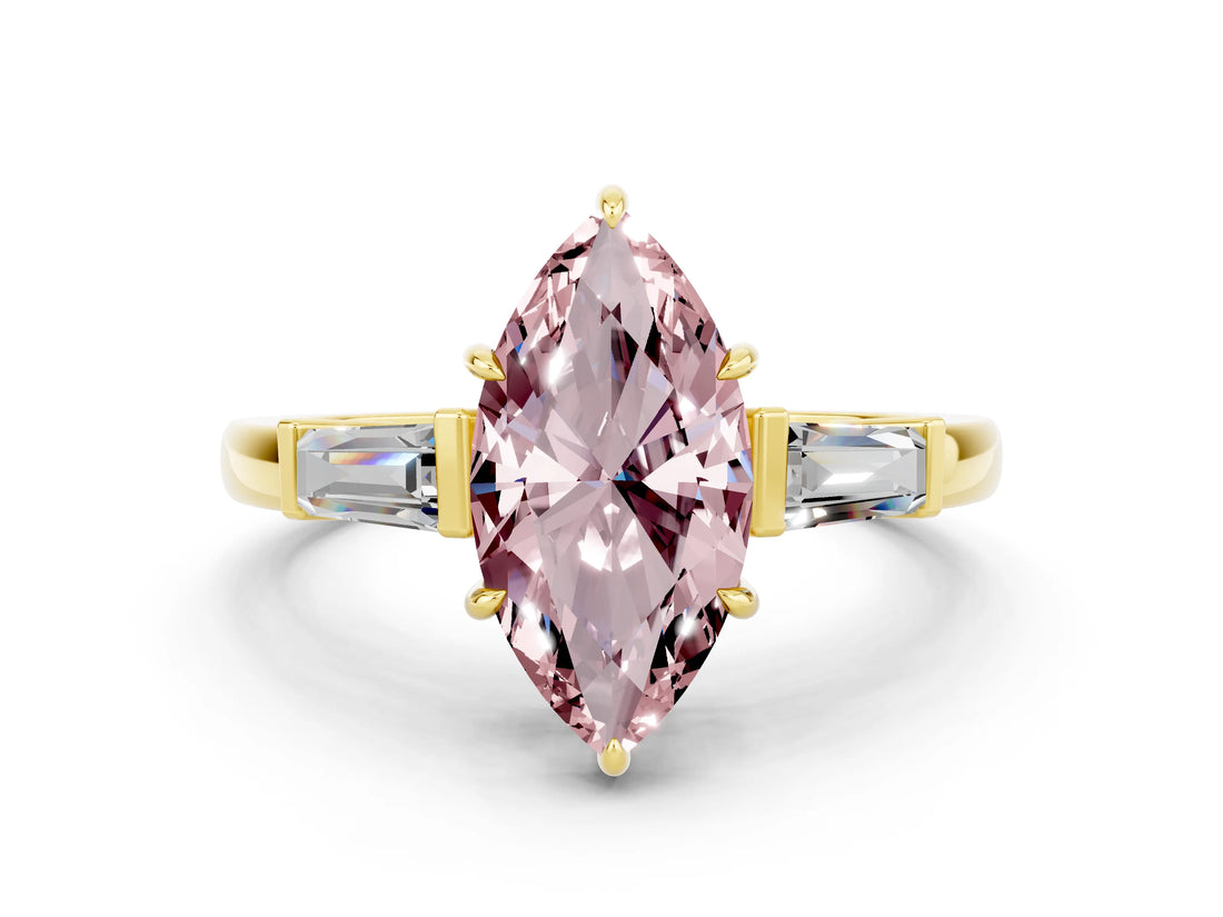 Yellow gold Marquise Cut Cut Diamond Ring with Tapered Baguette Side Stones in Four-Prong Setting