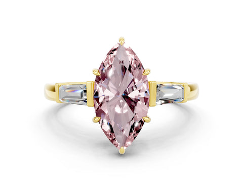 Yellow gold Marquise Cut Cut Diamond Ring with Tapered Baguette Side Stones in Four-Prong Setting