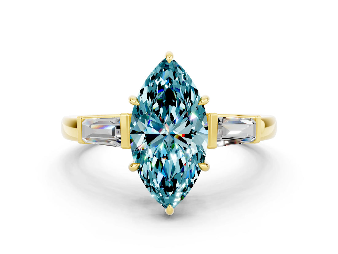Yellow gold Marquise Cut Cut Diamond Ring with Tapered Baguette Side Stones in Four-Prong Setting