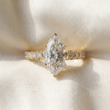 Yellow gold Marquise Cut Diamond Cathedral Solitaire Ring with Round  Pavé Band_181