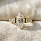 Yellow gold Marquise Cut Diamond Classic Solitaire Ring with Pavé Band and Four-Prong Setting_76