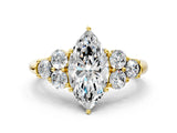 Yellow gold Marquise Cut Diamond Cluster Ring with Round Accent Stones and Prong Setting on a Classic Band_55
