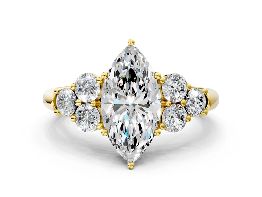 Yellow gold Marquise Cut Diamond Cluster Ring with Round Accent Stones and Prong Setting on a Classic Band