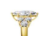 Yellow gold Marquise Cut Diamond Cluster Ring with Round Accent Stones and Prong Setting on a Classic Band_60