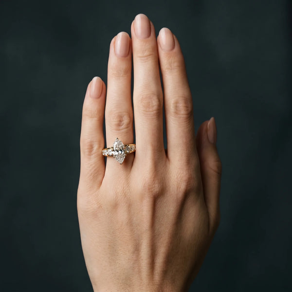 Yellow gold Marquise Cut Diamond Engagement Ring with Pavé Band and Four-Prong Setting