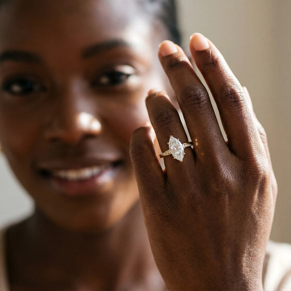 Yellow Gold Marquise Engagement Ring Setting with Twisting Accented Ribbon Band