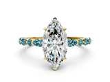 Yellow gold Marquise Cut Diamond Ring with Marquise and Round with Blue Topaz side stone Side Stones and Four-Prong Setting_24