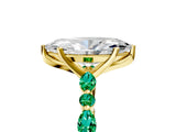 Yellow gold Marquise Cut Diamond Ring with Marquise and Round with Emerald side stone Side Stones and Four-Prong Setting_65