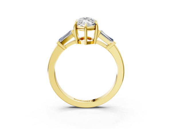 Yellow gold Marquise Cut Diamond Ring with Tapered Baguette Side Stones in Four-Prong Setting