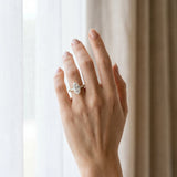 Yellow gold Marquise Cut Diamond Side Stone Solitaire Ring with Round  and Four-Prong Setting