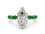 Yellow gold Marquise Cut Diamond Side Stone Solitaire Ring with Round with Emerald side stone and Four-Prong Setting