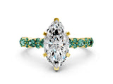 Yellow gold Marquise Cut Diamond Side Stone Solitaire Ring with Round with Green Sapphire side stone and Four-Prong Setting