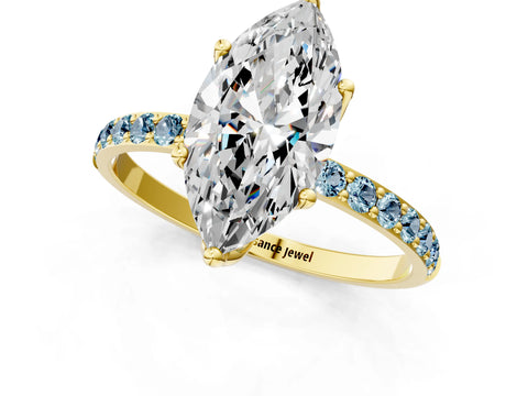 Yellow gold Marquise Cut Diamond Solitaire Engagement Ring with Round with Aquamarine side stone Pavé Band and Prong Setting_1