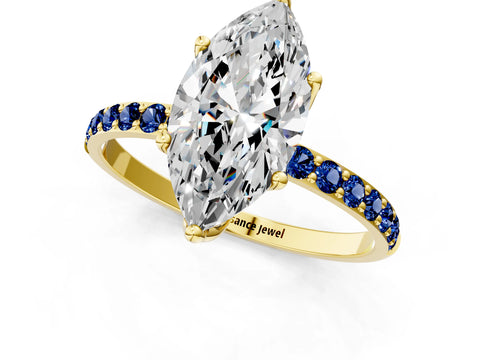 Yellow gold Marquise Cut Diamond Solitaire Engagement Ring with Round with Blue Sapphire side stone Pavé Band and Prong Setting_1