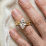 Yellow gold Marquise Cut Diamond Solitaire Ring with Engraved Band and Four-Prong Setting_81