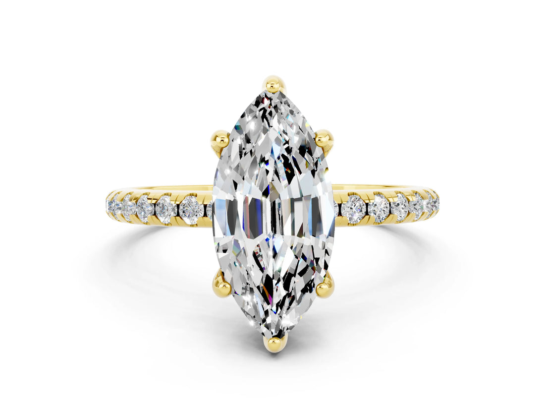 Yellow gold Marquise Cut Diamond Solitaire Ring with Four-Prong Setting and Pavé Band