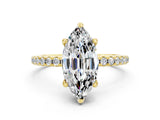 Yellow gold Marquise Cut Diamond Solitaire Ring with Four-Prong Setting and Pavé Band