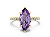 Yellow gold Marquise Cut Diamond Solitaire Ring with Four-Prong Setting and Pavé Band