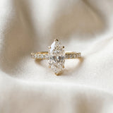 Yellow gold Marquise Cut Diamond Solitaire Ring with Pavé Accents and Four-Prong Setting_54