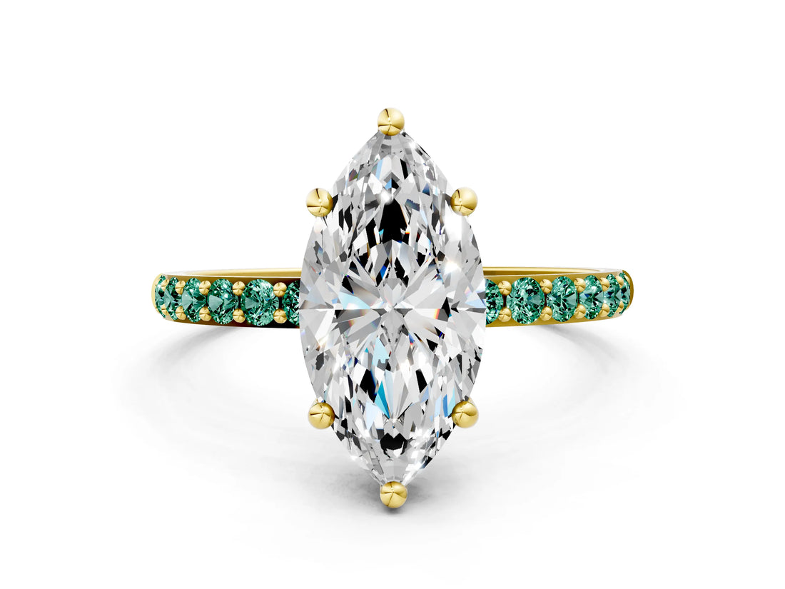 Yellow gold Marquise Cut Diamond Solitaire Ring with Round with Green Sapphire side stone Pavé Band and Prong Setting