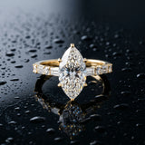 Yellow gold Marquise Cut Diamond Solitaire with Side Baguettes and Channel Set Band_64
