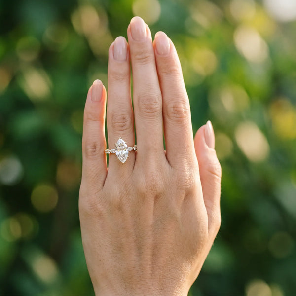 10K Yellow Gold 4.00 Carat F VS1 Marquise Diamond Ring with Marquise and Round  Side Stones and Four-Prong Setting