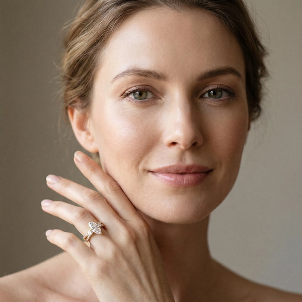 Yellow gold Marquise Cut Diamond Three-Stone Ring with Pavé Split Shank and Four-Prong Setting