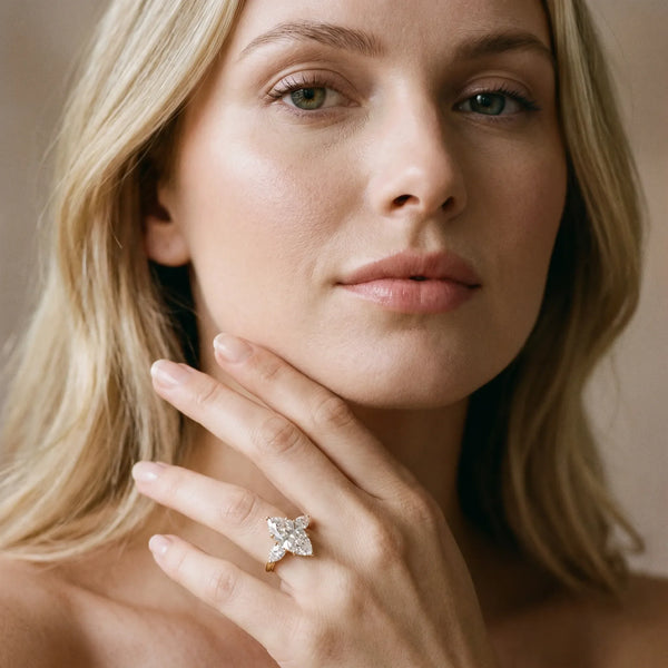 18K Yellow Gold 1.30 Carat D VS1 Marquise Diamond Three-Stone Ring with Pear Side Stones and Prong Setting